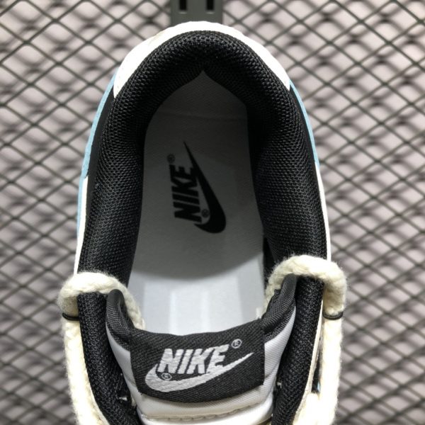 SB Dunk low Curious World, blue-black - Imagen 2